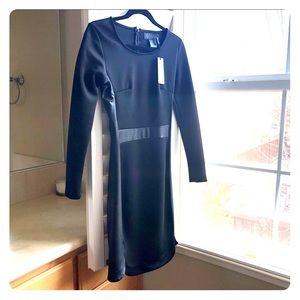 Black Midi Dress, figure hugging.